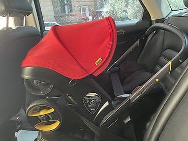 Doona+ Infant Car Seat & Stroller – Qırmızı rəngdə Həm uşaq — 1