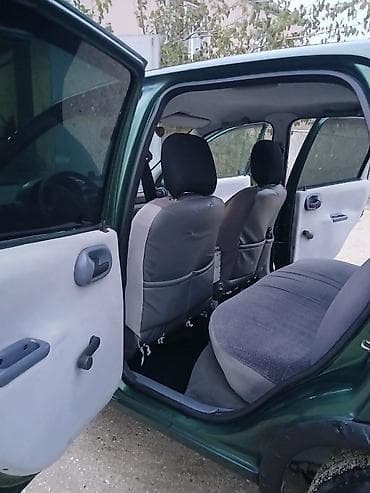 nissan note 1999: Opel Astra Caravan (ya da Astra F Universal) – yaşıl rəngli, 5 qapılı — 4