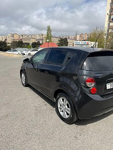 Chevrolet: Chevrolet Aveo: 1.4 л | 2013 г. 182601 км Хэтчбэк — 6