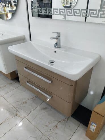 Ремонт и строительство: Ağ rəngli seramik lavabo və bej rəngli şkaf birlikdədir. Şkaf iki — 1