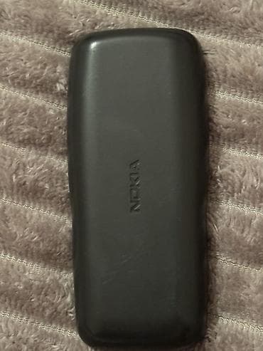 philips xenium 9@9u: Nokia rəng - Qara, Düyməli — 2