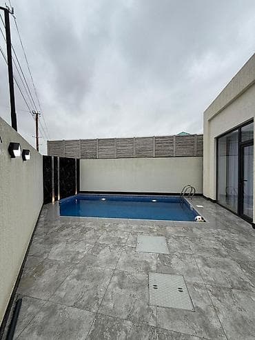 Mərdəkanda yerləşən isti, hovuzlu bağ evimiz xidmətinizdədi,xidmətə