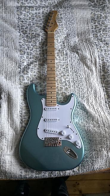 Smiger L-G2. Səsi və rəngi çox gözəldir, rəngi də parıltılıdır. Səsini