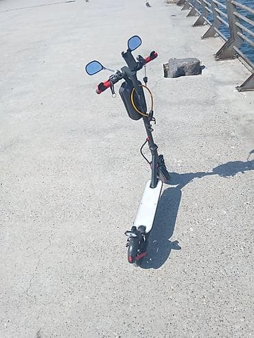 İşlənmiş Elektrik samokat 7", 351 - 500 Vt, 26 - 35 km/s, Ünvandan götürmə — 10