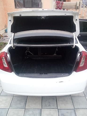 teker cixardan: Daewoo Gentra: 1.5 l | 2014 il Sedan — 7