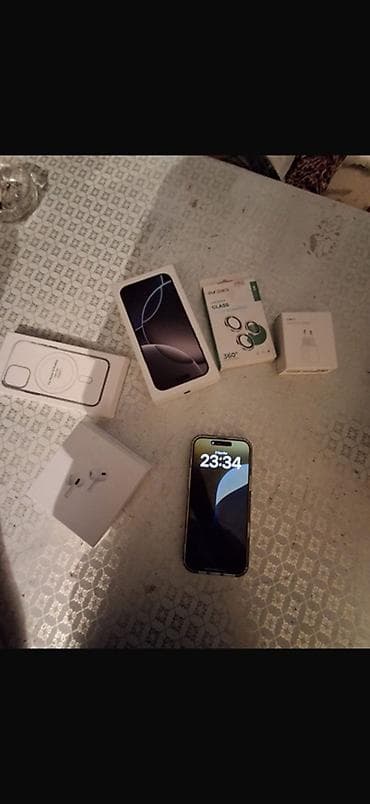 resmi 10 s: 256 GB, Black Titanium, Simsiz şarj — 1