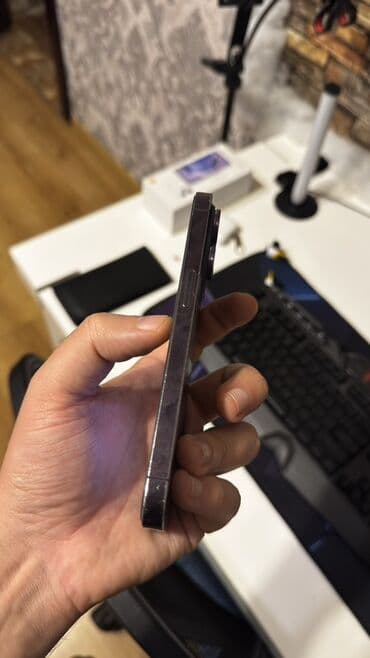 iphona 5: IPhone 14 Pro, 128 GB, Deep Purple, Face ID — 4