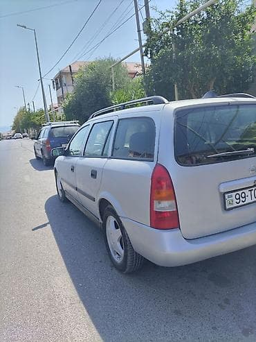 Nəqliyyat: Opel Astra: 1.8 l | 1999 il 554000 km Universal — 9