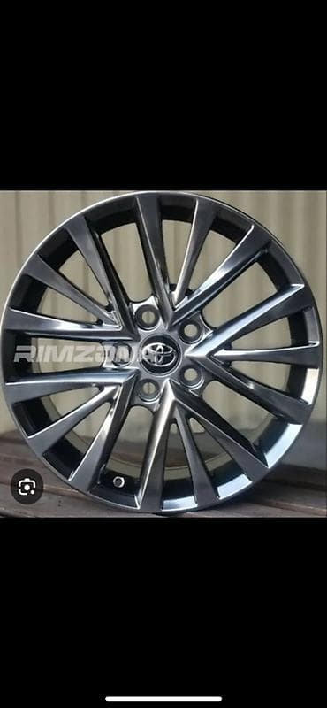 Toyota orijinal yüngül lehimli disk (rəsmi loqolu mərkəz qapağı ilə)