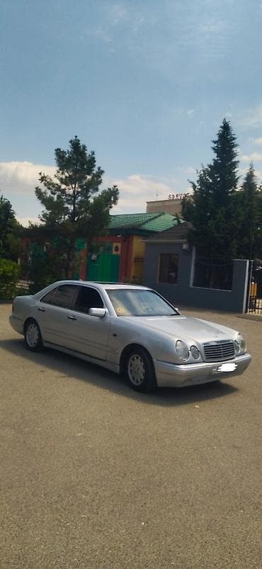 disk 14: Mercedes-Benz E-Class: 2.3 l | 1996 il Sedan — 5