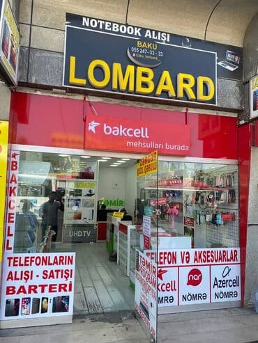 mağaza bağlanır: Telefon vitrini 5-(vitrin), aksesuar yeri, nömrə satışı, proqram və — 8