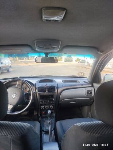 motosiklet telefon tutucu: Nissan Sunny: 1.6 l | 2008 il Sedan — 5