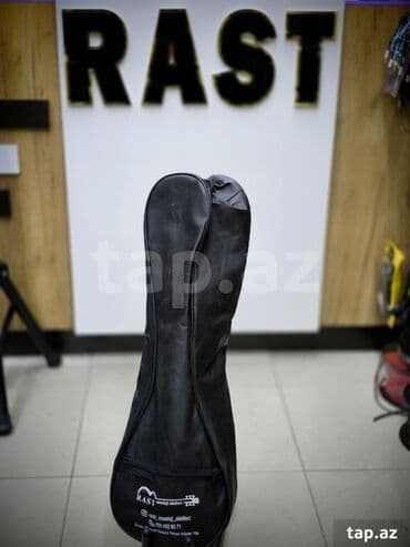 dominos sumqayit: Kamanca cantasi Rast musiqi alətləri mağazalar şəbəkəsi 3 ünvanda — 1