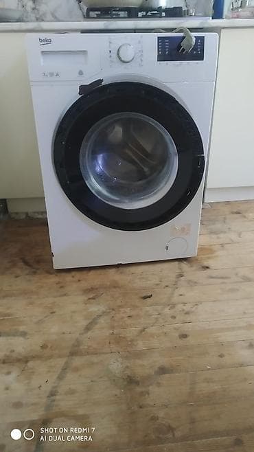 su samuru: Beko önyükləməli paltaryuyan maşın - Yükləmə həcmi: 7 kq - Enerji — 1