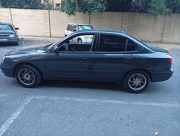 lider disk: Hyundai Elantra: 2 l | 2003 il Sedan — 4