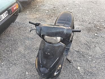 tek teker scooter: Skuter – şəhər içi qısa məsafələr üçün kompakt benzinli model - — 1