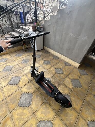 elektro samokat: Elektrikli skuter – şəhər daxili səmərəli hərəkət üçün — 1