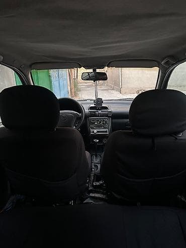 cone cors: Opel Vita: 1.4 l | 1999 il 20000 km Hetçbek — 4