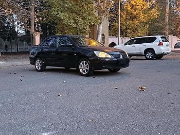 hyundai elantra teker: Mitsubishi Lancer: 1.6 l | 2005 il 290000 km Sedan — 1