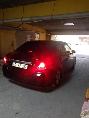 sprinter satisi: Nissan Tiida: 1.6 l | 2006 il Sedan — 4
