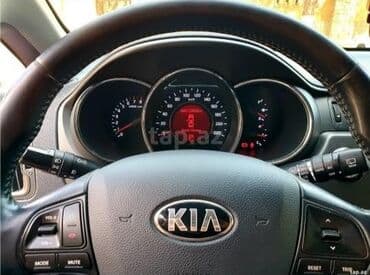 ilkin odenis 2000 azn olan masinlar: Kia Rio hatchback – parlaq qırmızı rəngli, kompakt və şəhər üçün ideal — 8
