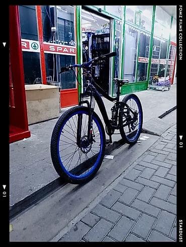 stels velosipedleri: Dağ tipli velosiped - Rəng: mat qara gövdə, mavi disklər və şin — 2