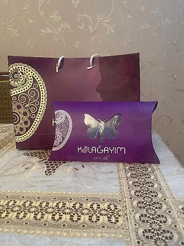 Paltolar: Məhsul: Kəlağayı – 100% ipək Təsvir: - Brend: Kəlağayım — 1