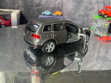 20 qepik: Коллекционная модель volkswagen touareg grey metallic 2003 kinsmart — 16