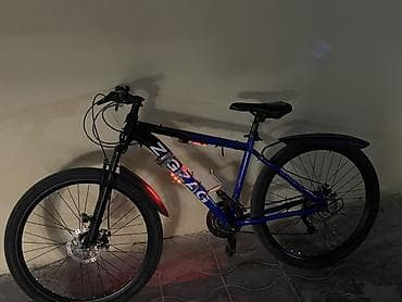 Книги и журналы: ZigZag dağ velosipedi - Rəng: mavi-qara gövdə, “ZIGZAG” loqolu - — 2