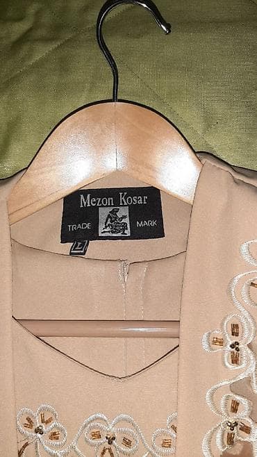 Şəxsi əşyalar: Paltar təzədir.Geyinilməyib.Ölçü: L — 4