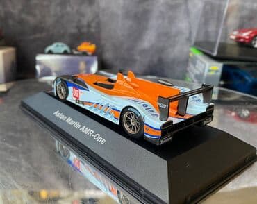 где можно продать марки: Коллекционная модель Aston Martin AMR-One #7 Gulf Team LeMans 2011 — 19