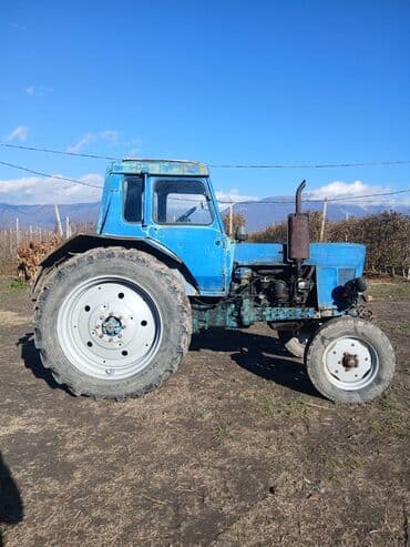 w210 arxa stoplar: Mavi rəngli təkərli kənd təsərrüfatı traktoru. Texniki xüsusiyyətlər — 5