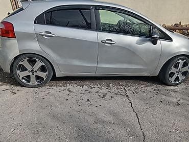 tofas masin: Kia Rio: 1.4 l | 2011 il Hetçbek — 4
