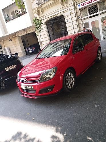 disk qabi: Opel Astra H hatchback – qırmızı rəng, 5 qapı, şəhər üçün çevik və — 3
