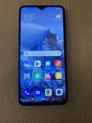 telefon alan: Xiaomi smartfon - Ekran: təxminən 6.3" ölçülü tam ekran, damla-tip ön — 1