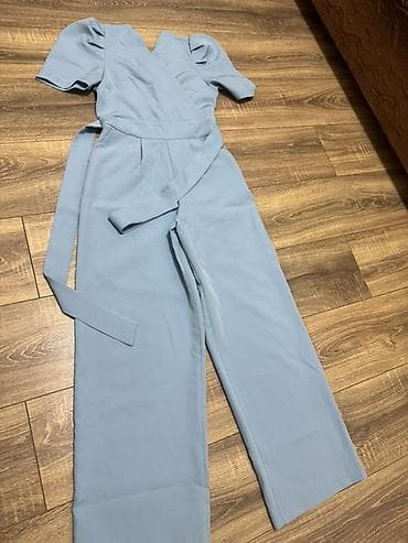 Baş geyimləri: Məhsul: Açıq mavi kombinezon 36 ölçüdür ama 38’lerde geyine biler. - — 1