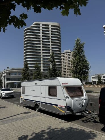 qoşqu mala: Yeni gelib Azerbaycana Ili 2005 Yeni kimidir! Butun funksiyalari — 2