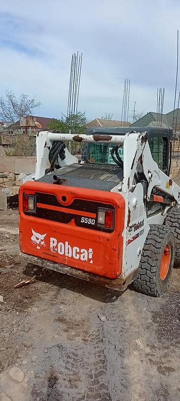 t 16 traktor: Bobcat S590 .servis texnikasi.veziyeti super.xerci yoxdu qaycili — 5