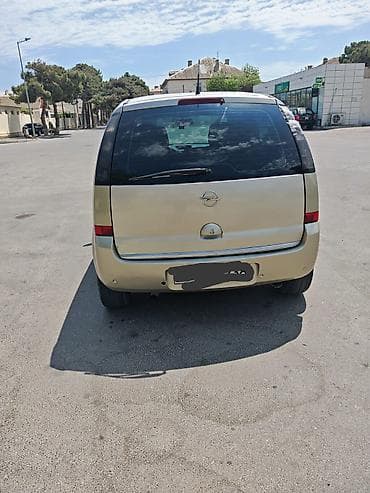mini cps: Opel Meriva: 1.3 l | 2006 il 500000 km Van/Minivan — 2