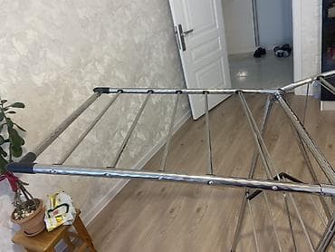 metbex cilciraqlari: Metal geyim qurudan asılqan – üçayaqlı, qatlanan model — 1