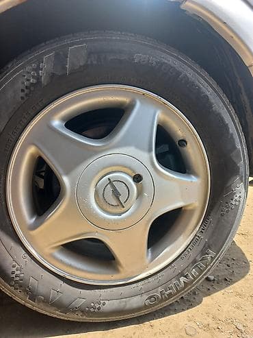 - Markalar: Kumho və Solus (M+S Radial Tubeless yazıları var). - Ölçü — 1