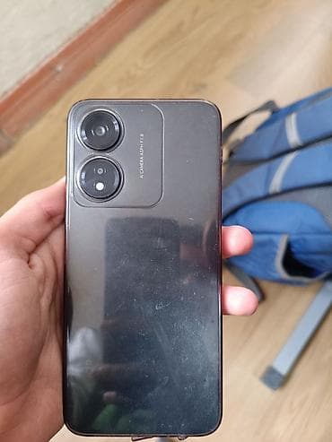 Smartfon – arxa tərəfində ikiqat kamera modulu və “AI Camera, 4.95P