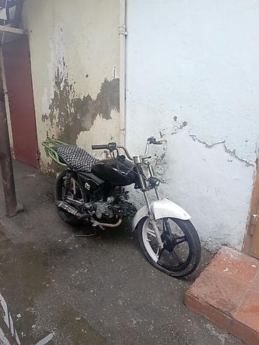 balaca motosiklet: Motoriklet — kiçik həcmli, şəhərdaxili gediş-gəliş və çatdırılma üçün — 1