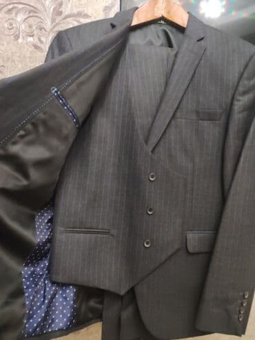 kişi ucun klassik qara kostyum: Kostyumlar — 1