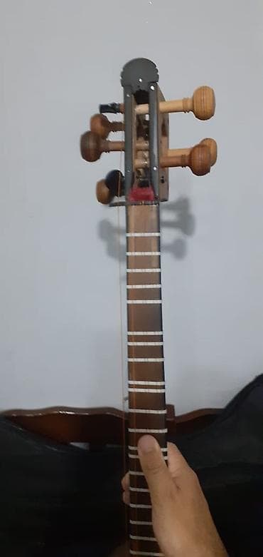 Тар: Tar – milli simli musiqi aləti - Korpus: ikiqat armud formalı — 8