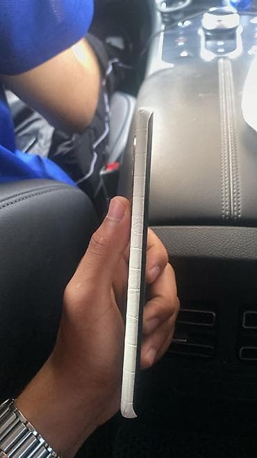 xiaomi note 15 pro plus: Smartfon – ağ krokodil teksturalı arxa qapaqlı, dairəvi kamera modullu — 3