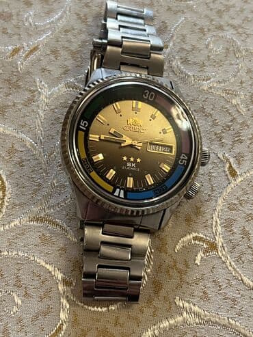 versace qızıl qolbaq: Qol saatı, Orient, rəng - Gümüşü — 1