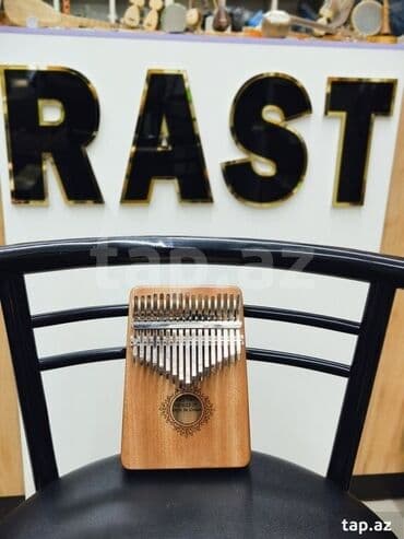 dominos sumqayit: Kalimba musiqi aləti Rast musiqi alətləri mağazalar şəbəkəsi 3 ünvanda — 1