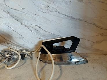 qaz peci qiyməti: Məhsul: Elektrik ütü Təsvir: - Klassik dizaynlı, metal altlıqlı — 2