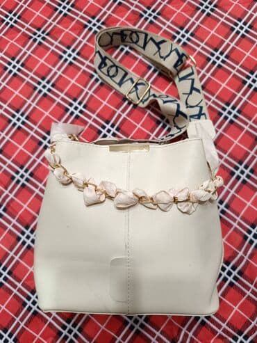 Bej rəngli çiyin çantası - Material: yumşaq eko‑dəri - Forma lalafo.az -da Bej rəngli çiyin çantası - Material: yumşaq eko‑dəri - Forma